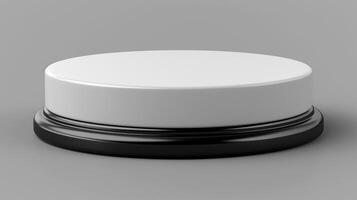 White button with black base on gray background photo