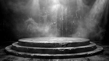 Black and white photo of a stage with a spotlight