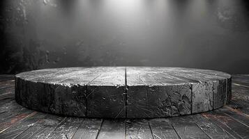A wooden table with a spotlight on it photo