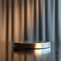 An empty silver round table on a table with a curtain photo