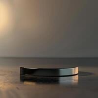 A black and silver object sitting on a table photo