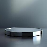 A round silver plate on a table with a reflection photo