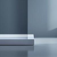 A white box sitting on a table in front of a window photo
