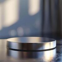A silver object sitting on top of a table photo