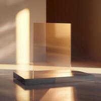 A glass display on a table in front of a wall photo