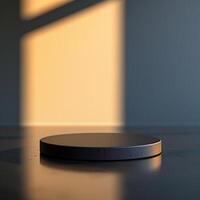 A black object sitting on a table in front of a window photo