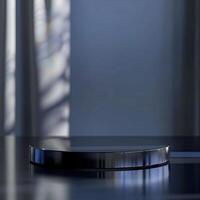 A black table with a circular object sitting on it photo
