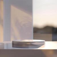 A white object sitting on a table in front of a window photo