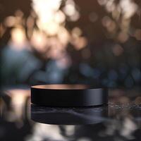 A black object sitting on a table in front of a blurry background photo