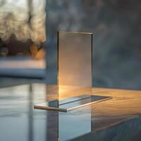A mirror on a table with a light shining on it photo