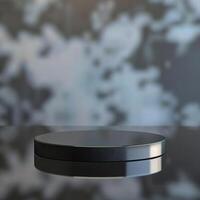 A black round object on a table with a blurred background photo