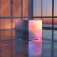 A cube with a pink and blue light shining through it photo