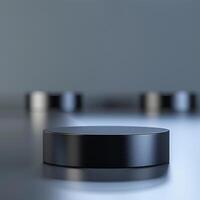 A black round object on a table with a reflection photo