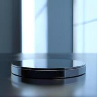 A black circular object on a table in front of a window photo