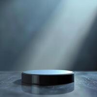 An empty black round table on a table with a spotlight photo