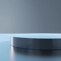 A round table with a silver surface on a table photo