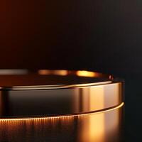 A shiny black and gold circular object on a table photo