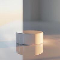 A white object sitting on a table in front of a window photo