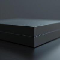 A black box sitting on a table with a reflection photo