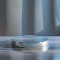 A round silver object on a table photo