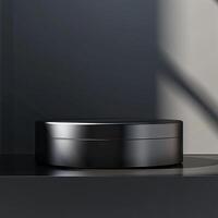 A black box sitting on a table in front of a window photo