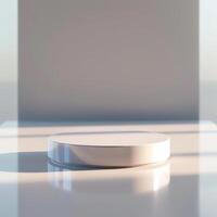 A white round table on a white surface photo