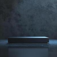 A black box sitting on a table in front of a wall photo