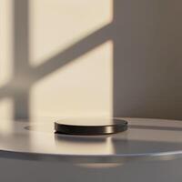 A small black object sitting on top of a table photo