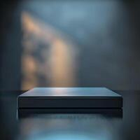 A black box sitting on a table in front of a window photo