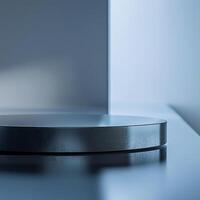 A black circular object sitting on top of a table photo