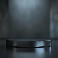 An empty black round table on a dark background photo