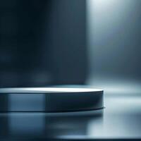 A white circular object on a table in front of a dark background photo