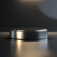 A black and silver circular object on a table photo