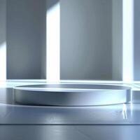 A white circular table in a room with light coming from the windows photo