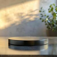 A black circular object on a table photo