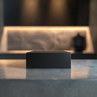 A black box sitting on a counter top photo