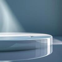 A white plate on a table with a light shining on it photo