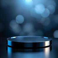 A black circular plate on a table with a blue background photo