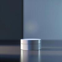 A white container sitting on a table in front of a wall photo