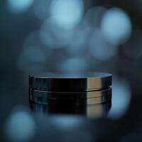 A black container sitting on a table with a blue background photo