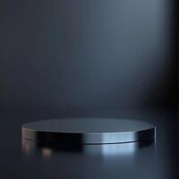 An empty black round table on a dark background photo