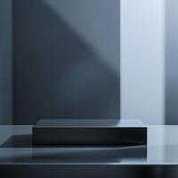 A black box sitting on a table in front of a wall photo
