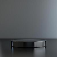 A black round object on a table with a gray background photo