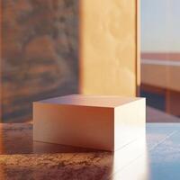 A white box sitting on a table in front of a window photo