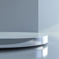 A white round table with a reflection of the light photo