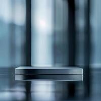 A silver box sitting on a table in front of a window photo