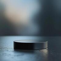 Black round object on a table with blurred background photo