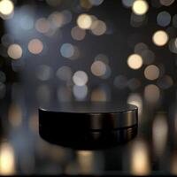 Black round object on a table with lights in the background photo