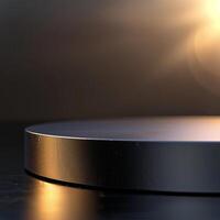 A black circular table with a light shining on it photo