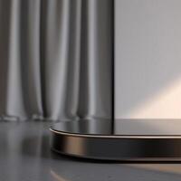 A black and silver object on a table photo